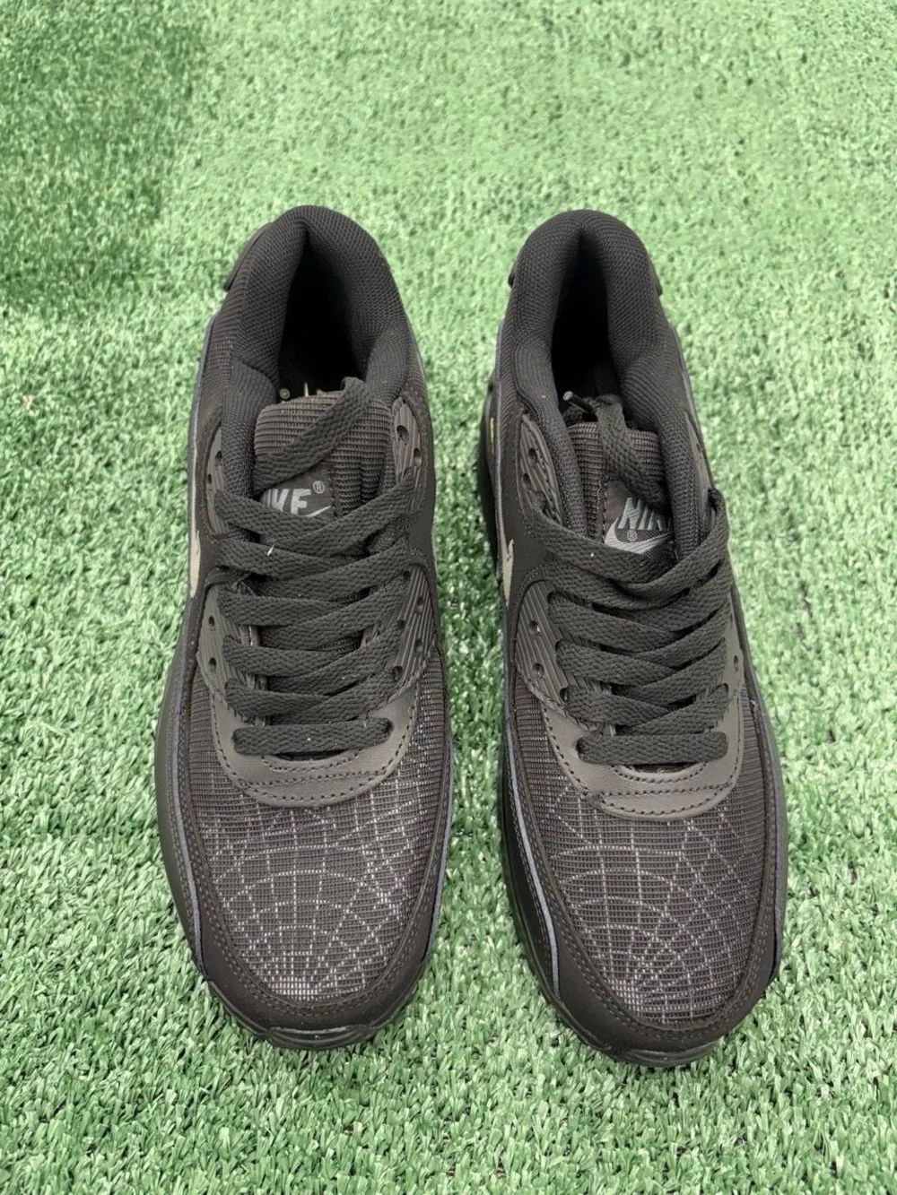 Nike Women’s Black Athletic Sneakers with Subtle Pattern